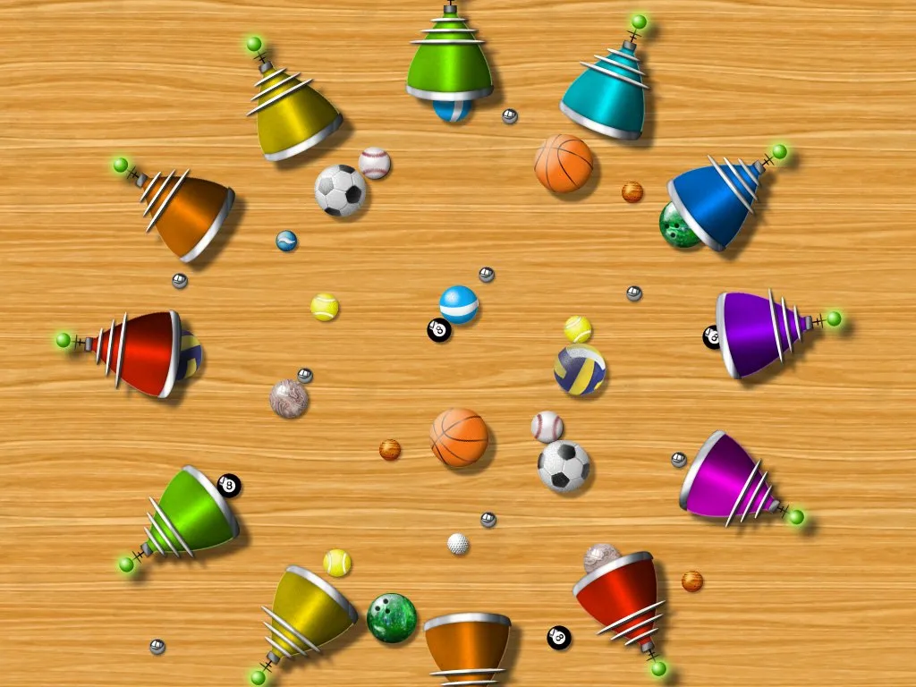 A ring of funnels firing basketballs, footballs, marbles and golf balls toward the centre.